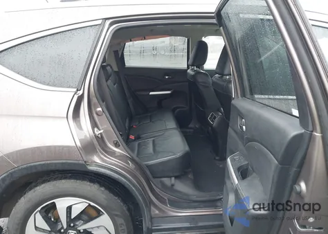 2016 Honda Cr-V Touring z USA, uszkodzony, nr VIN 5J6RM4H91GL024719